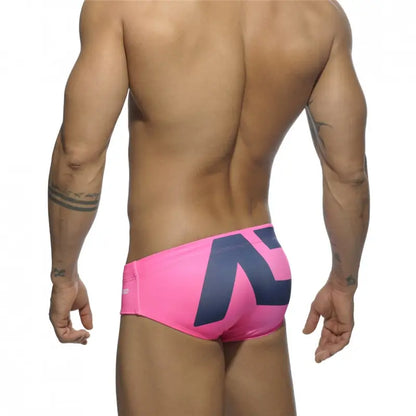 DomiGe fashion swim briefs in pink — model rear view	