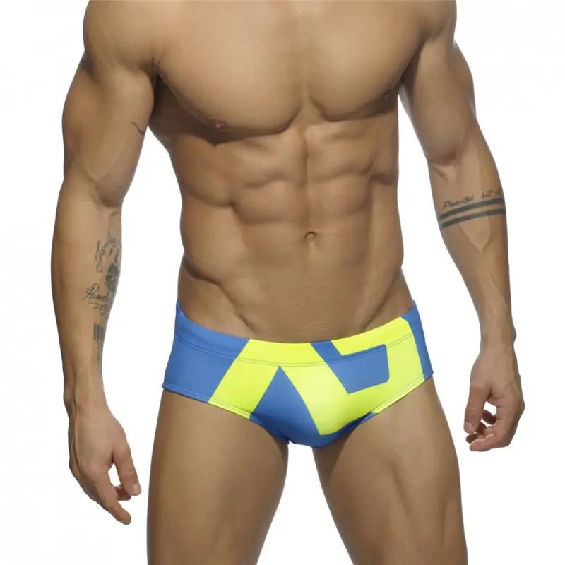 DomiGe fashion swim briefs in sky blue — model front view	