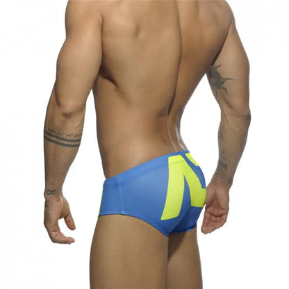 DomiGe fashion swim briefs in sky blue — model rear view	