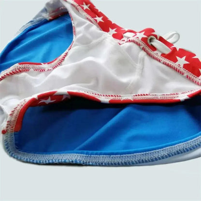 DomiGe flag print swim briefs in red — product detail	