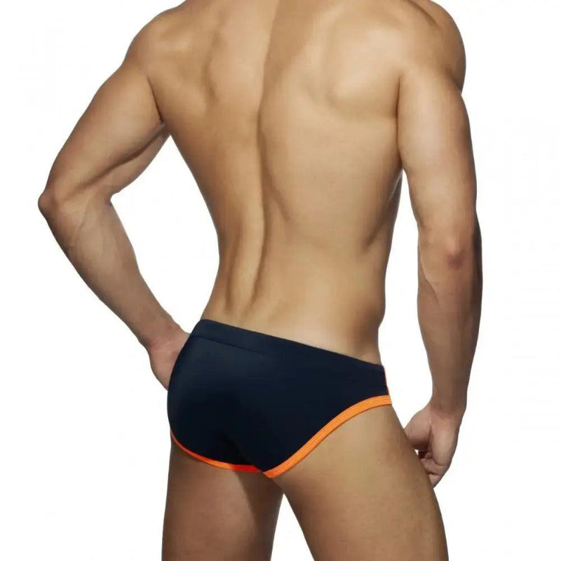 DomiGe leopard print swim briefs in orange — model rear view	