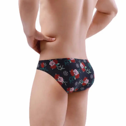 Rear view of DomiGe black low-rise cotton briefs — full-coverage back design with rounded silhouette	