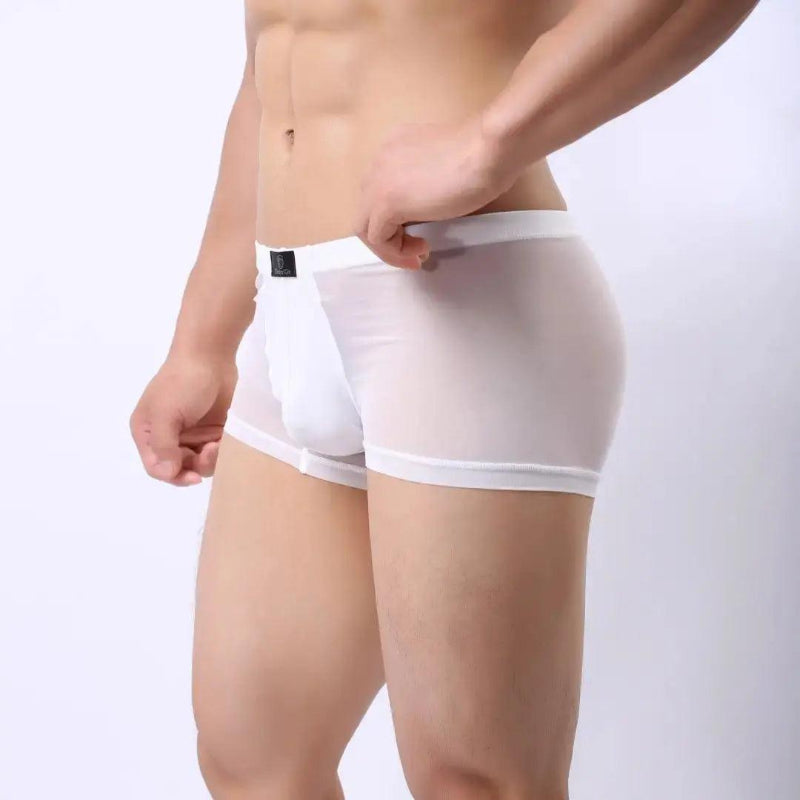 Side view of DomiGe white modal mesh boxer briefs — seamless construction with front bulge support design	