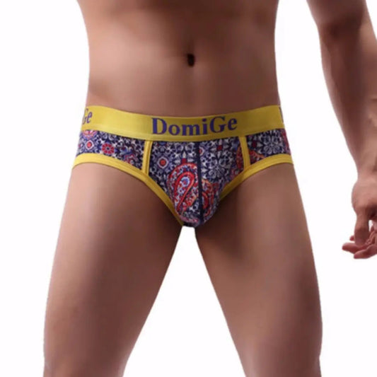 Men's red paisley print briefs — DomiGe 3D contoured front pouch with yellow waistband and blue logo	