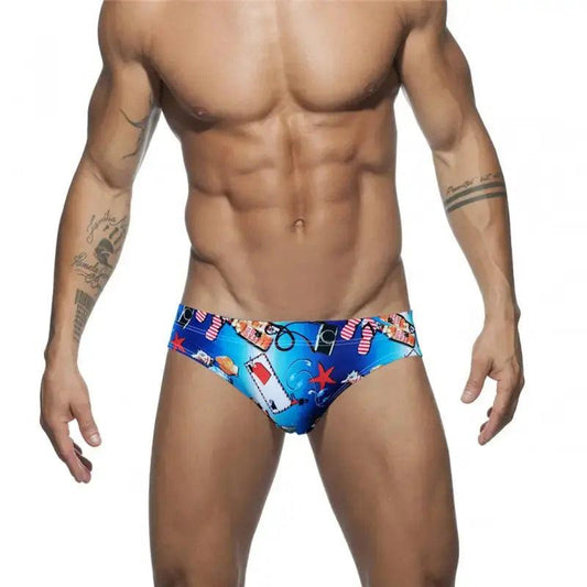 DomiGe quick-dry printed swim briefs in sky blue — front	