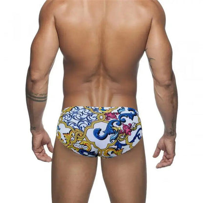 DomiGe quick-dry printed swim briefs in white — rear	