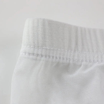 DomiGe sheer boxer briefs in white — close-up fabric detail showing sheer nylon mesh texture and modal pouch lining	