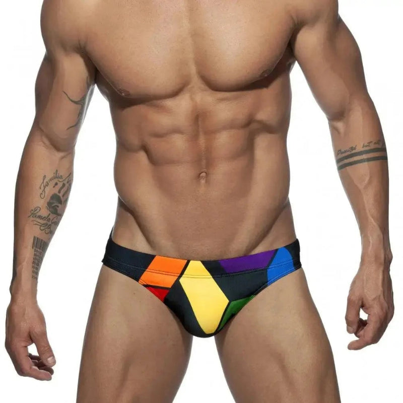 DomiGe men's solid swim briefs in black — model front view	