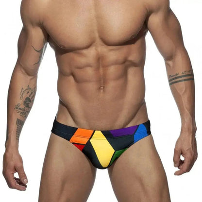 DomiGe men's solid swim briefs in black — model front view	
