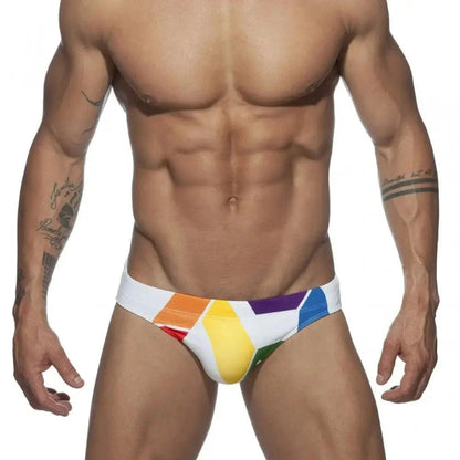 DomiGe men's solid swim briefs in white — model front view	