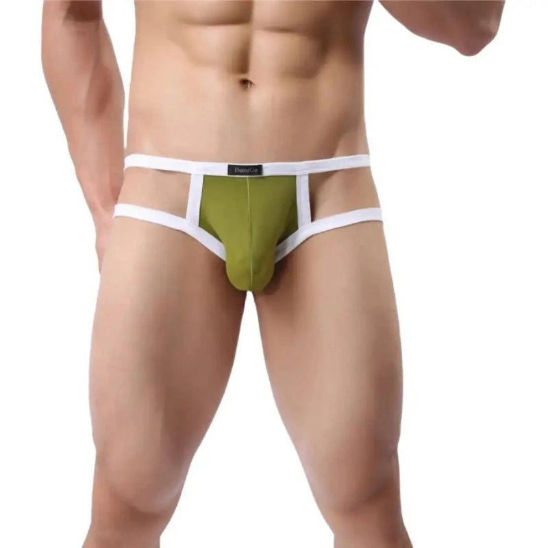 DomiGe X-Design jockstrap in army green — model front view showing enhanced front pouch and open back design	