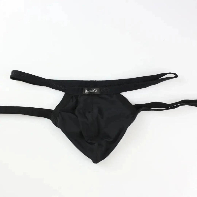 DomiGe X-Design jockstrap in black — flat lay front view showing enhanced contour pouch design	