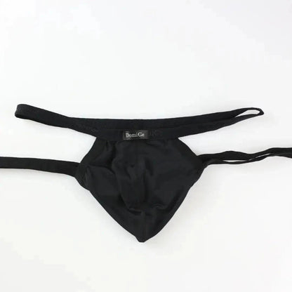 DomiGe X-Design jockstrap in black — flat lay front view showing enhanced contour pouch design	