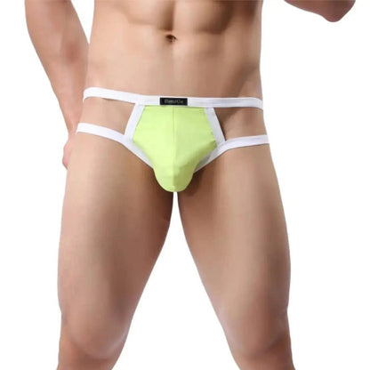 DomiGe X-Design jockstrap in light green — model front view showing enhanced front pouch and open back design	
