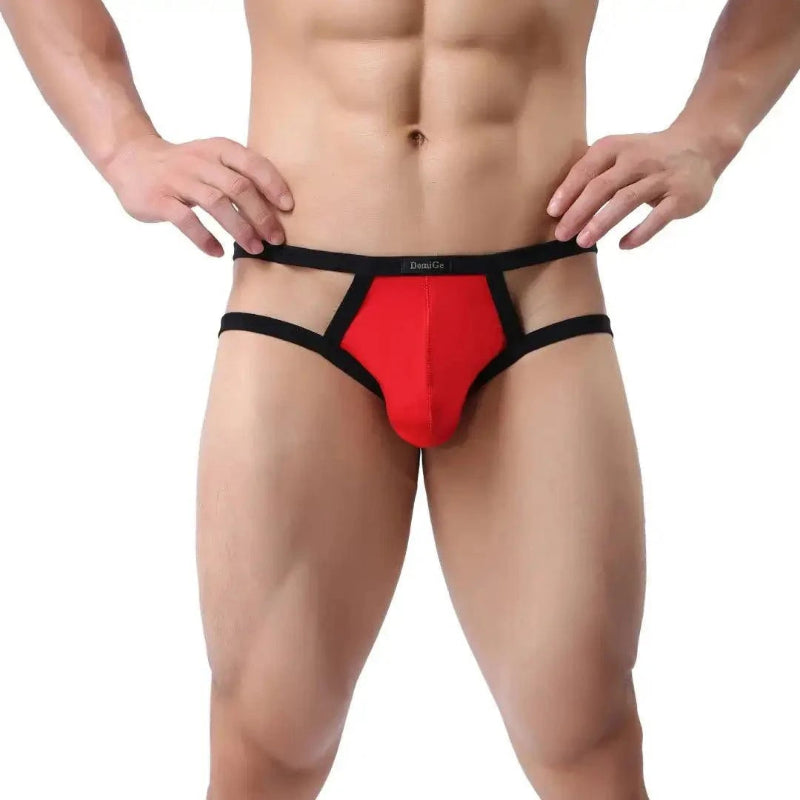 DomiGe X-Design jockstrap in red — model front view showing enhanced front pouch and open back design	