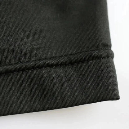 88.6% polyester 11.4% spandex stretch fabric texture close-up black — moisture-wicking tank DomiGe	