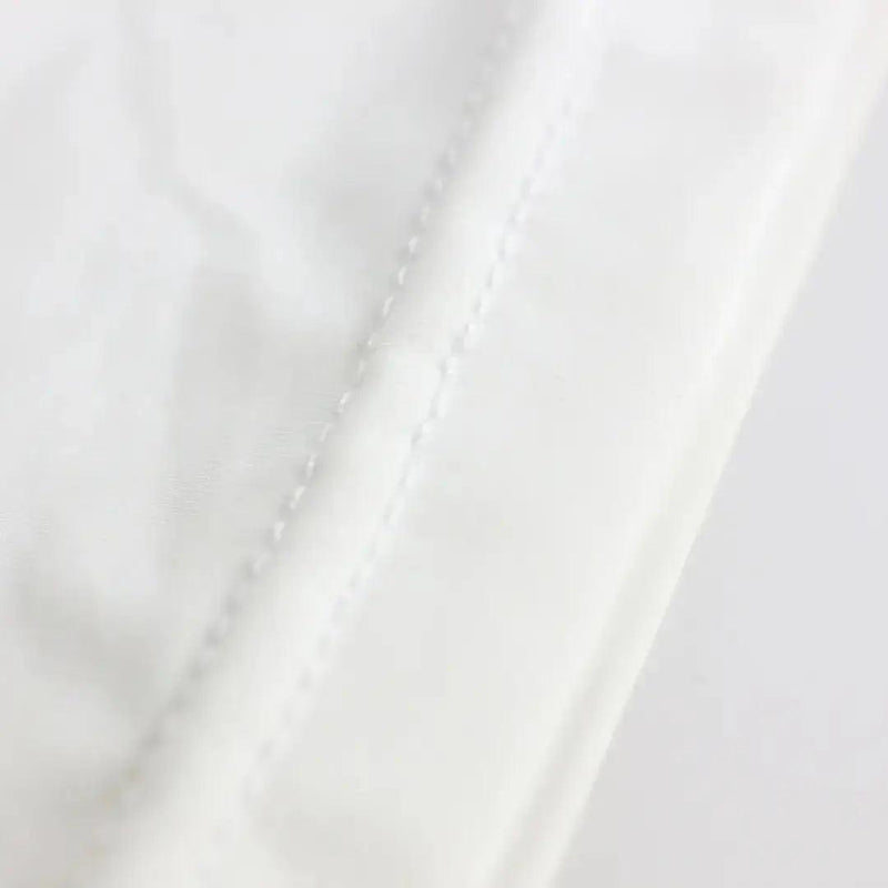 DomiGe lay-flat collar detail white — no-bacon-collar engineered finish short sleeve tee	