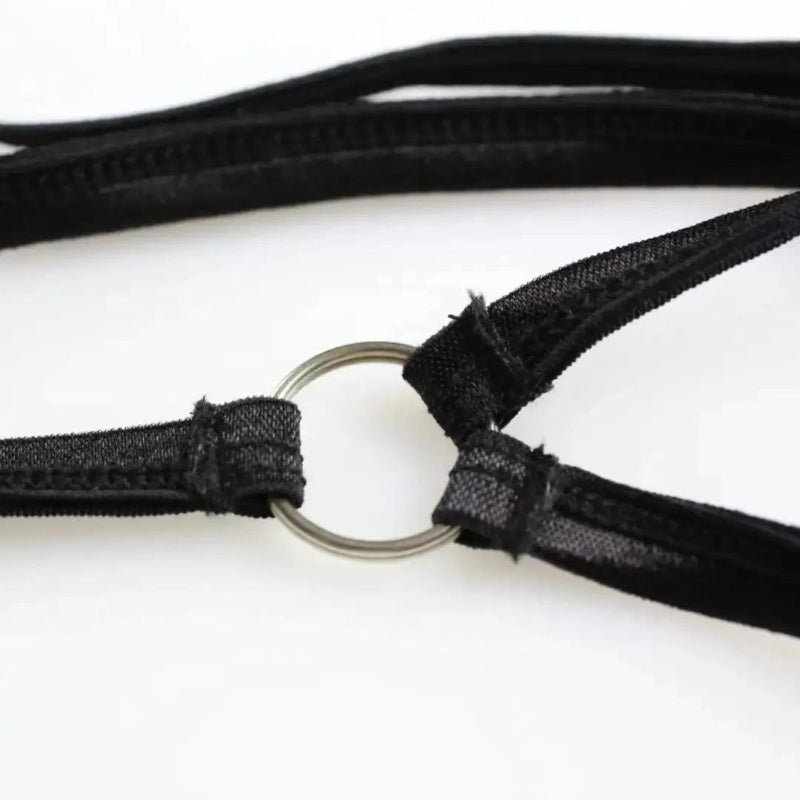 DomiGe Y-back strap detail close-up — vertical split into two at waistband white thong	