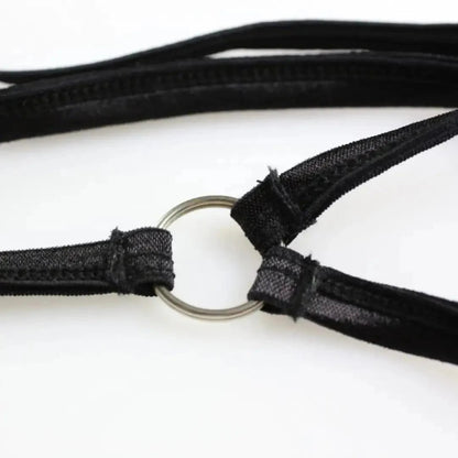 DomiGe Y-back strap detail close-up — vertical split into two at waistband white thong	